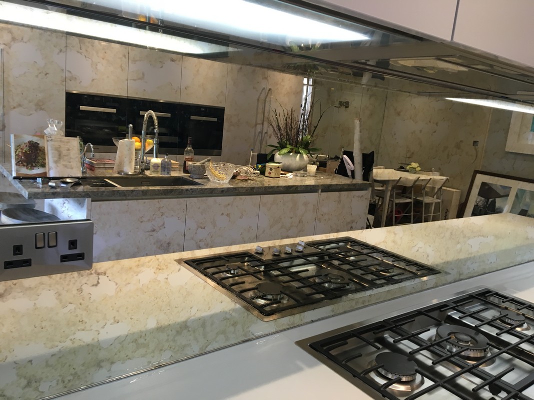 Mirror glass splashback in Westcombe Park luxury kitchen